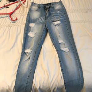 Light wash fashion nova ripped skinny jeans